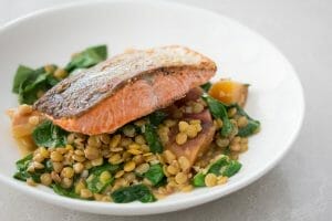 Seared Salmon with Green Lentils, Roasted Beets, Wilted Kale and Sauce Vierge